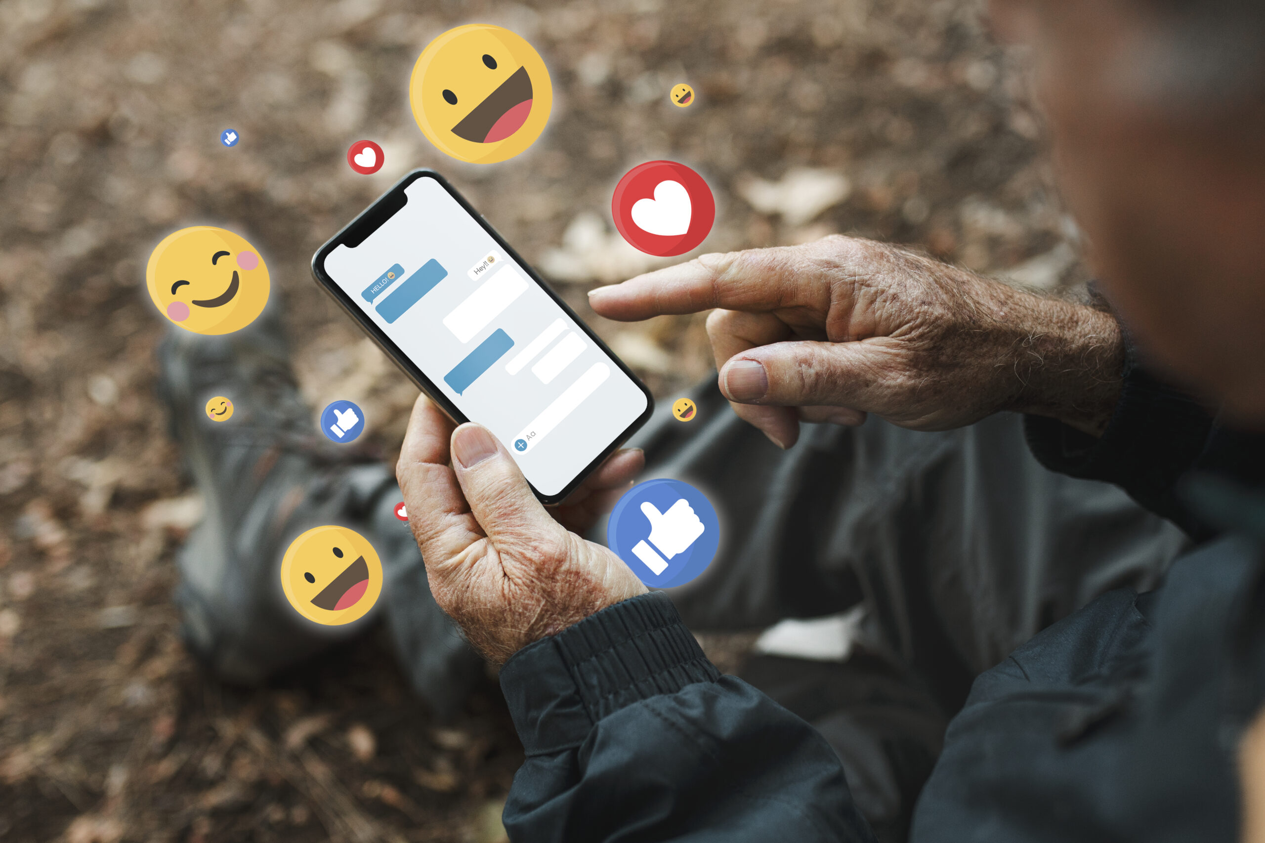 Senior man receiving positive reactions from social media